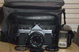 Olympus OM1 Starter pack. Comes with 35mm film camera, lens and more - £247.75 GBP