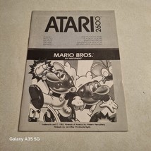 Atari 2600 Mario Brothers game manual in excellent condition  - $16.73 CAD