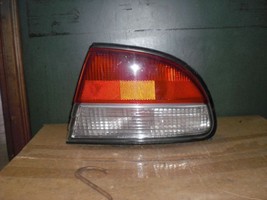 Right Tail Light Quarter Panel Mounted Red 4Dr ES Z OEM 97 98 Mitsubishi... - $10.65