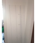 white metal shelf with clothes hanger line - $77.94