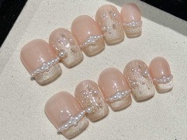 Nude and Champagne Pearl Press On Nails with Glitter and Rhinestones Man... - $467.56 MXN