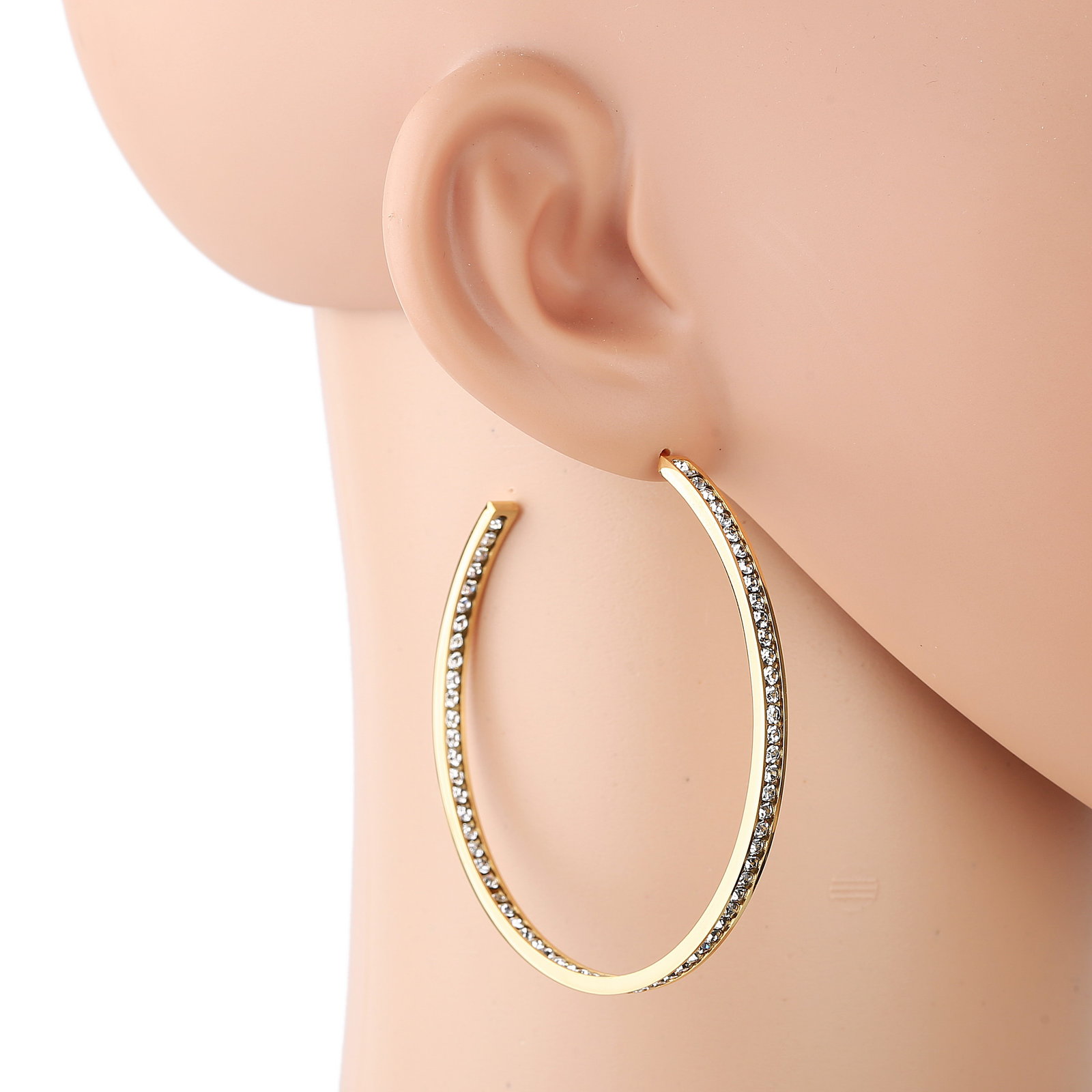 gold tone hoop earrings with sparkling swarovski style crystals