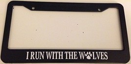 I Run with Wolves with Paw Print - Automotive Black License Plate Frame ... - $20.99