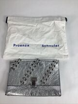 Proenza Shouler Silver Metallic Pierced Clutch With Dust Bag - $2,258.71 MXN