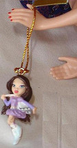 Miniature ice skater Bratz doll ornament purpl suit vintage holiday figurine toy - £7.85 GBP