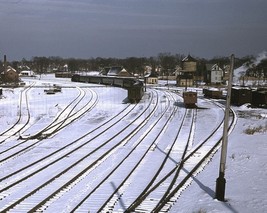 Train tracks and water tower in the snow in Massachusetts 1940 Photo Print - $8.81+