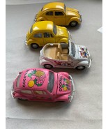 VINTAGE LOT OF (4) CARS.  VW three Beetle's, One Convertible Beetle. Oval - $20.79
