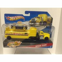 Hot Wheels Speed Team - Car plus Transport Rig - Purple &amp; Yellow W4671 - $11.29