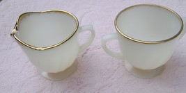 An item in the Pottery & Glass category: Small Anchor Hocking Milk Glass Sugar & Creamer