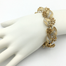 LISNER? vintage leaf &amp; berry panel bracelet - textured gold-tone &amp; white... - $25.00