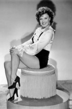 Ginger Rogers in Roxie Hart Sitting Round Chair Leg Up Smiling 24x18 Poster - £19.11 GBP