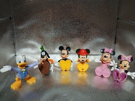 5 Moveable Disney Figures And 1 That Is Not - $19.79