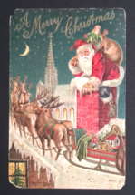 A Merry Christmas Santa Climbing into Chimney w/ Reindeer Embossed Postcard 1906 - $14.99