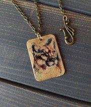 Pendant made of brass on a chain. Puma. - £21.68 GBP