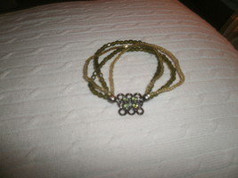 3 Strand Lime Green Beaded Bracelet , Metal Pendant with Lime Green Rhin... - $2.00