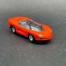 Johnny Lightning Chevrolet Chevy Corvette Indy Sports Car Orange Diecast 1/64 - £9.91 GBP