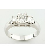 Authenticity Guarantee

18k White Gold Three-Stone Princess and Emerald ... - $86,212.06 MXN