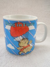 Enesco Hang In Thee Garfield & Odie Mug 1986 - $2.99