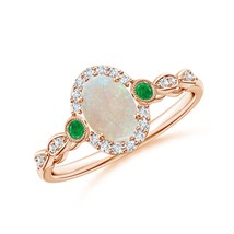 Authenticity Guarantee

ANGARA Vintage Opal and Diamond Ring with Bezel Emera... - $809.10