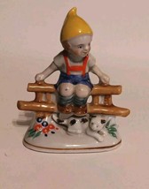 Little Dutch Boy and Cat Sitting on Fence Figurine Has Small Chip In Hat, Japan - $4.25