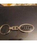 Audi Keychain with rotating logo - $258.97 MXN