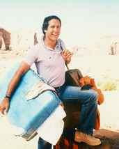 Chevy Chase Color 16x20 Canvas National Lampoon's Vacation carrying luggage - $69.99