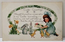 Easter Greetings Girl &amp; Rabbits and Chicks Trying on her Bonnet 1922 Pos... - $5.99