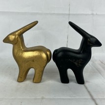 Lot of 2 Ceramic Deer Antelope Figurines Black Gold 5.5&quot; Tall - £7.85 GBP