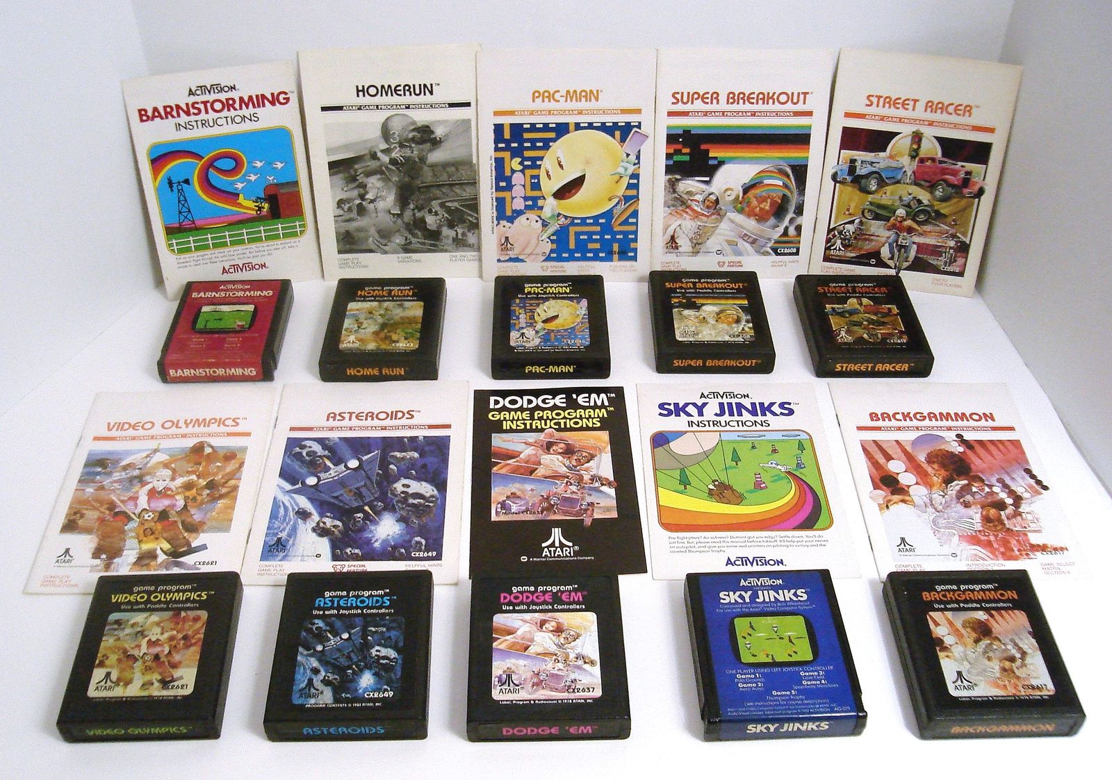 Primary image for Atari 2600 Game Lot with Manuals Pacman Super Breakout Barnstorming Sky Jinks