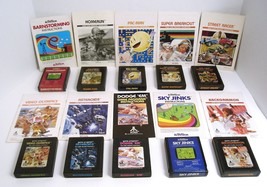 Atari 2600 Game Lot with Manuals Pacman Super Breakout Barnstorming Sky ... - $49.95