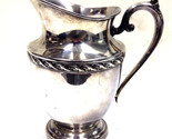 W.m. rogers Pitcher Spring flower pitcher 22580 - $199.00