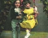 Adorable Children on Swing Boy Girl Flowers Spring Yellow Dress 1909 Pos... - $7.53
