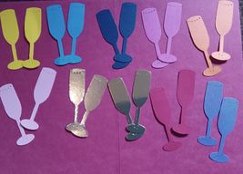 20 champagne die cuts. Approx 6cm x 2cm. Assorted colours. Sizzix. New. - $2.52