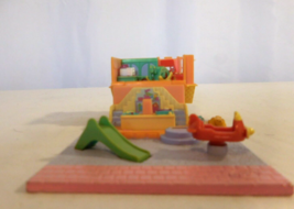 Polly Pocket Pollyville 1993 Toy Shop with its slide and airplane - $19.82