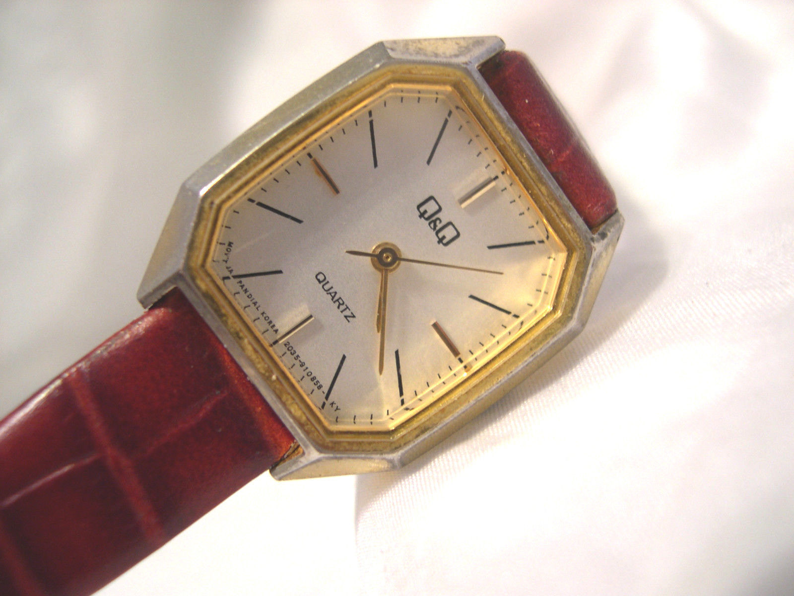 L62, Q&Q, Ladies Gold Tone Hexogonal Watch, 7.5" Leather Band, w/b - $19.79