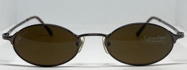 New Vintage Calvin Klein Ck 514/s Sunglasses Oval Titanium C. 9 Brown Japan 50mm - £131.19 GBP