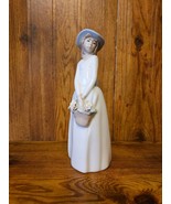 Vintage Regina Princess House Exclusive Figurine Lady With Basket Of Flo... - $38.19 CAD