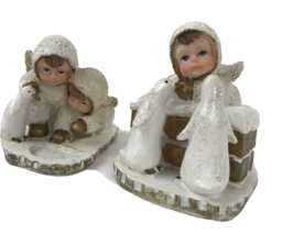 Vintage Snow Angel Babies with Penguins lot of 2 figurines Christmas Winter - £15.81 GBP