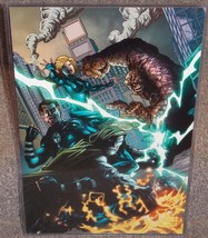 Marvel Fantastic Four vs Dr Doom Glossy Print 11 x 17 In Hard Plastic Sleeve - £19.65 GBP