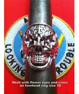 Skull with flower eyes and cross on forehead - £1.95 GBP