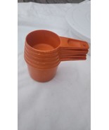 Vintage Tupperware Measuring Cups in Orange. 5 piece - $11.70