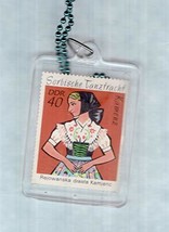 An item in the Everything Else category: Collectible International Stamp Novelty Necklace - German Folk Costume