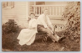 RPPC Young Lady And Man Sitting On Steel Master Toy Wagon Photo Postcard M24 - £8.75 GBP