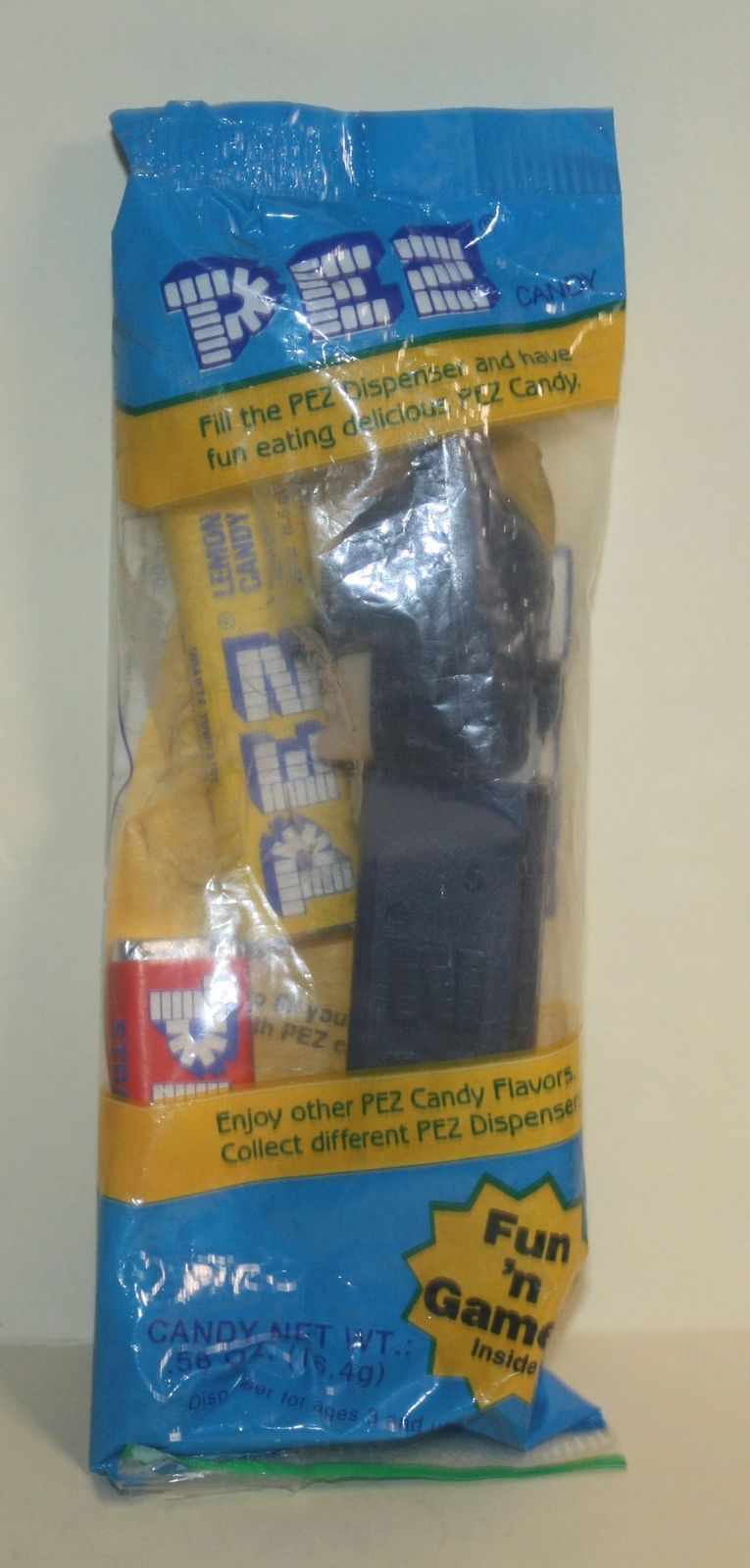 Pez Dark Knight Batman Yellowish Face Pointed Ears in Blue Package - $4.00