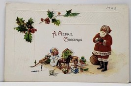 Christmas Santa with Toys Embossed 1923 to Ellsworth Wis Postcard H8 - $3.95