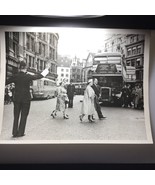 1957 Press Photo Royal Crown Queen Mother, Elizabeth Crossing street Bobby - $33.91 CAD