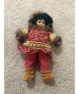 Vintage Arctic-Inspired Porcelain Eskimo Doll Tall Wooden Body Moveable ... - $56.09