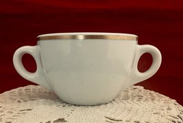 Vintage Syracuse China style 3-cc two handled white teacup with gold trim - $7.28