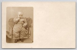 RPPC Adorable Chubby Baby On Wicker Chair c1910 Real Photo Postcard U29 - £11.70 GBP