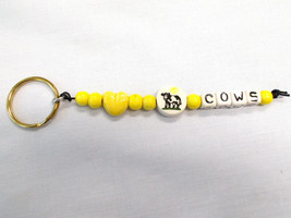 CERAMIC BEADED YELLOW HEART &amp; COW IN THE SUN DISC w COWS TEXT KEY CHAIN ... - $7.99